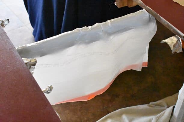plastic trash bag over leaf rail