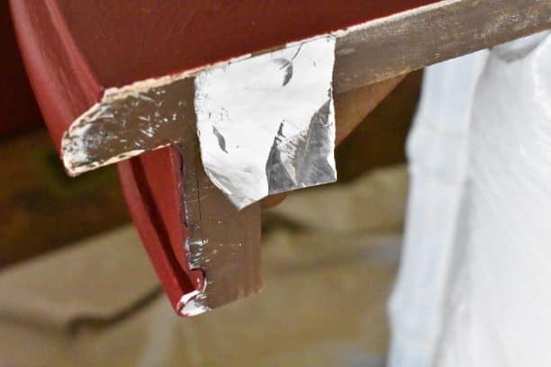 aluminum tape over dowel hole in table